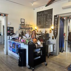 Beastly Books - Lovely hosts Kayden and Kirsten, and coffee menu.