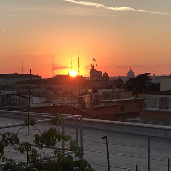 Ambrosia Rooftop Restaurant & Bar - The sun setting over Rome. - Italian Near Me - Rome, RM Ambrosia Rooftop Restaurant & Bar - The sun setting over Rome. - Italian Near Me - Rome, RM