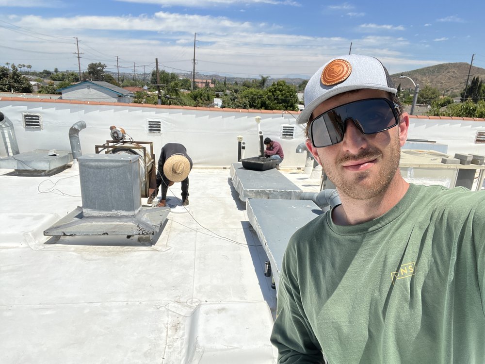 Slide of Swell Roofing
