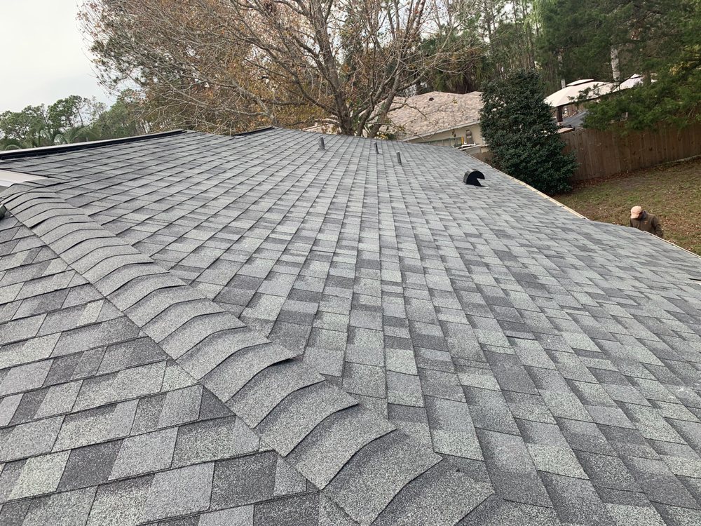 Slide of EZ Roofing of Flagler County