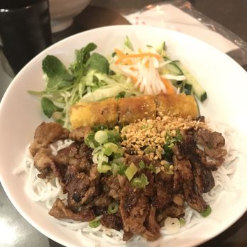 Pho Time Authentic Vietnamese Eatery - Bowl of rice noodles with spring rolls and pan fried pork - Vietnamese Near Me - Markham, Ontario