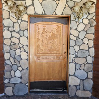 Silver Star Painting - Carved wooden front door. I was really worried about having someone prep and stain our custom-carved door, but they did a great job. - Painters Near Me - Apple Valley, California Silver Star Painting - Carved wooden front door. I was really worried about having someone prep and stain our custom-carved door, but they did a great job. - Painters Near Me - Apple Valley, California