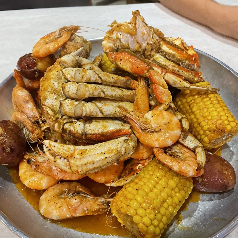 Surfing Crab - a platter of seafood and corn - Seafood Near Me - Corpus Christi, Texas Surfing Crab - a platter of seafood and corn - Seafood Near Me - Corpus Christi, Texas
