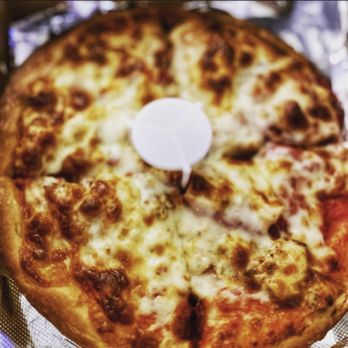 Carbone's Pizza & Subs - a close up of a pizza - Pizza Near Me - Buffalo, New York Carbone's Pizza & Subs - a close up of a pizza - Pizza Near Me - Buffalo, New York