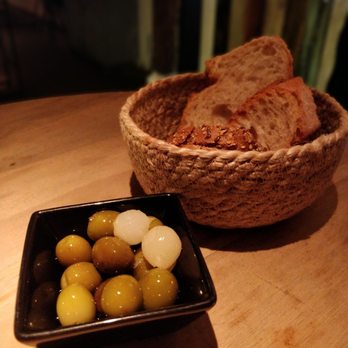 TriCiclo - Complimentary olives and bread - Tapas Bars Near Me - Madrid, M TriCiclo - Complimentary olives and bread - Tapas Bars Near Me - Madrid, M