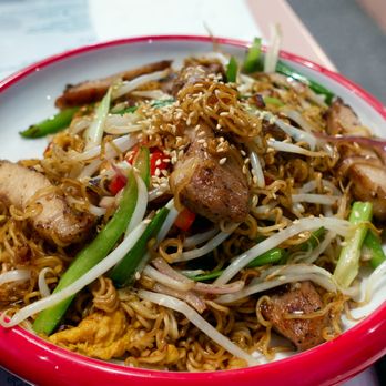 Kong Sihk Tong - XO Sauce Fried Instant Noodles with Pork Chops (XO醬豬扒公仔麵): Low-quality, fatty pork chop pieces. - Hong Kong Style Cafe Near Me - Flushing, New York