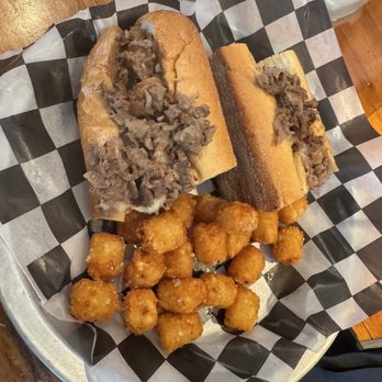 Rehoboth Ale House - Downtown - Ribeye Cheesesteak and tots. - Venues & Event Spaces Near Me - Rehoboth Beach, Delaware Rehoboth Ale House - Downtown - Ribeye Cheesesteak and tots. - Venues & Event Spaces Near Me - Rehoboth Beach, Delaware