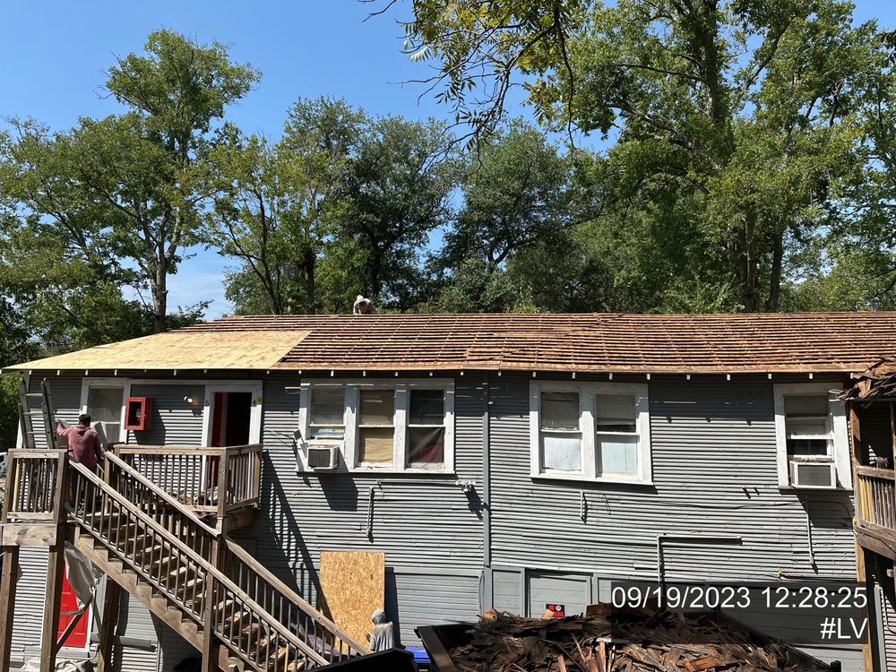 Slide of Busse Roofing