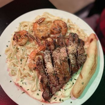Downtown Bistro - Steak and shrimp on fettuccine Alfredo - American Near Me - Kennett, Missouri Downtown Bistro - Steak and shrimp on fettuccine Alfredo - American Near Me - Kennett, Missouri