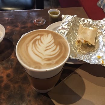The Hideout Coffeehouse - Mocha with part of burrito - Coffee & Tea Near Me - Austin, Texas The Hideout Coffeehouse - Mocha with part of burrito - Coffee & Tea Near Me - Austin, Texas