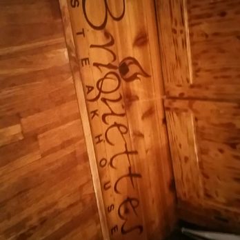 Briquettes Steakhouse - Nice floor art inside. - Steakhouses Near Me - Mobile, Alabama Briquettes Steakhouse - Nice floor art inside. - Steakhouses Near Me - Mobile, Alabama