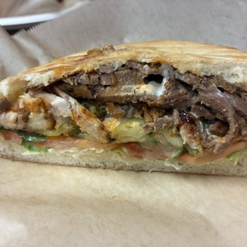 Ikram Grill - #5 - Mixed Doner Pide ($15.79). The bread is made in house. I ask for ALL the sauces. Super good. - Turkish Near Me - Fountain Valley, California Ikram Grill - #5 - Mixed Doner Pide ($15.79). The bread is made in house. I ask for ALL the sauces. Super good. - Turkish Near Me - Fountain Valley, California