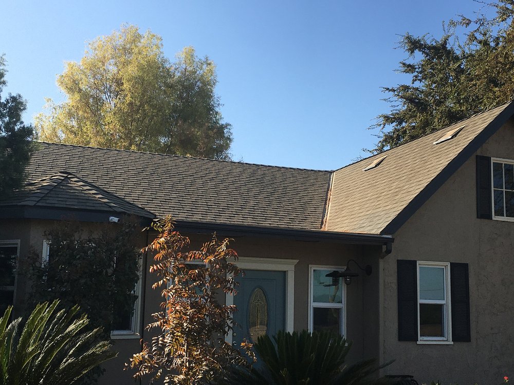 Slide of Roofing Pros