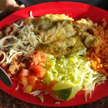 Taco El Jalisciense - My wife's enchiladas with salsa verde. The salsa had some good heat to it. - Mexican Near Me - Chicago, Illinois