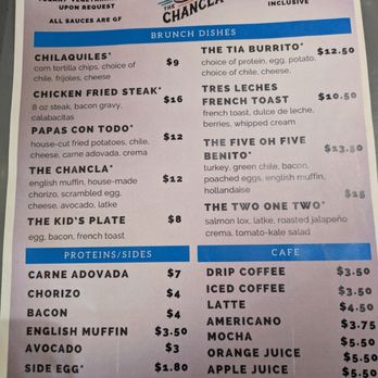 The Chancla ABQ - Menu - The menu from The Chancla restaurant includes sections for brunch dishes, proteins and sides, and beverages. Brunch options feature chilaquiles, chicken fried steak, tacos, and French toast, with prices ranging from $8 to $16. Proteins and sides include carne adovada, chorizo, bacon, and sides like a fried egg and fruit cup. Beverage choices include coffee, latte, americano, mocha, orange juice, apple juice, and fountain drinks. The menu emphasizes gluten-free options and house-made dishes. - Breakfast & Brunch Near Me - Albuquerque, New Mexico