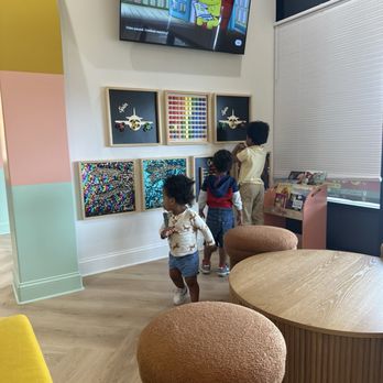 Candy Care - Fidget board, curious George, comfy seating - Pediatric Dentists Near Me - Baltimore, Maryland Candy Care - Fidget board, curious George, comfy seating - Pediatric Dentists Near Me - Baltimore, Maryland