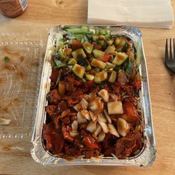 Shah’s Halal Huntington Station - Grilled Chicken Over Rice with salad and bbq sauce.