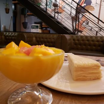 Mango Mango Dessert - Durian Millie cake (behind) and Mango juice with Mango ice cream (front left) - Desserts Near Me - Philadelphia, Pennsylvania Mango Mango Dessert - Durian Millie cake (behind) and Mango juice with Mango ice cream (front left) - Desserts Near Me - Philadelphia, Pennsylvania