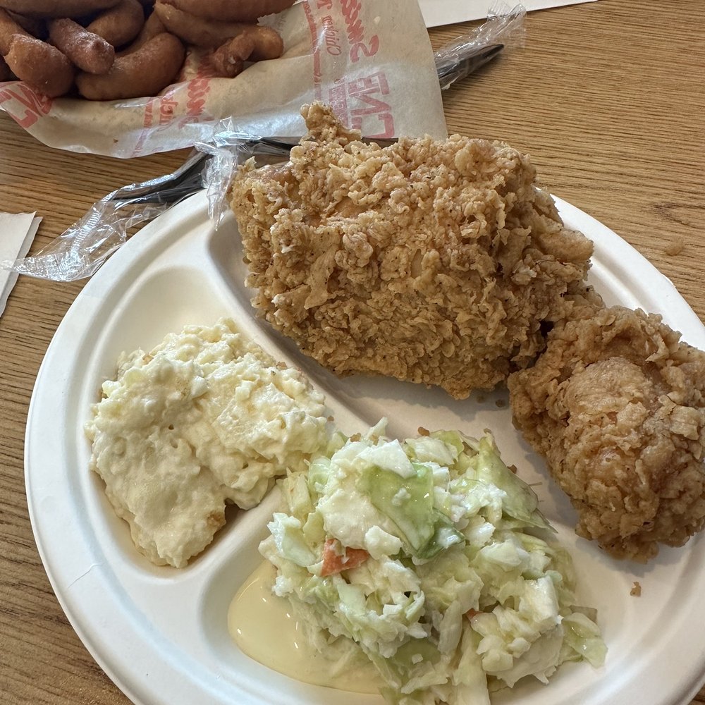 dark meat chicken, potato salad, cole slaw, hushpuppies.