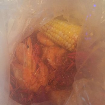 Holly Crab - Steaming hot crawfish and shrimp combo in garlic butter sauce with spicy heat - Seafood Near Me - Boston, Massachusetts Holly Crab - Steaming hot crawfish and shrimp combo in garlic butter sauce with spicy heat - Seafood Near Me - Boston, Massachusetts