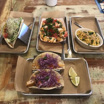 Curia On the Drag - Falafel roti, loaded tater tots, Mac & cheese, baja "fish" tacos - Coffee & Tea Near Me - Gainesville, Florida