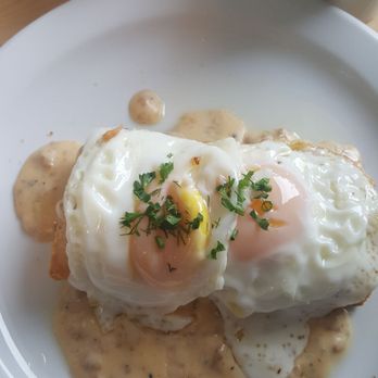 Main Road Biscuit - Biscuit with sausage gravy, and two eggs over - Breakfast & Brunch Near Me - Jamesport, New York Main Road Biscuit - Biscuit with sausage gravy, and two eggs over - Breakfast & Brunch Near Me - Jamesport, New York