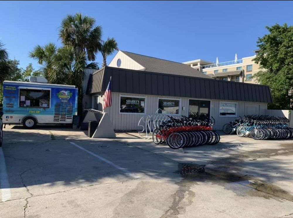 Sharky's Bike Rentals & Surf Shop Logo