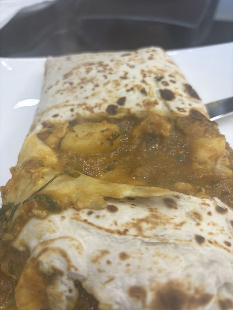 9 Spices Indian Roti Cuisine Logo