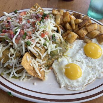 Moab Grill - Green chili chiliqueles. Very good. Like nachos but cheese isnt melted. I had to try the local green chilis - American Near Me - Moab, Utah