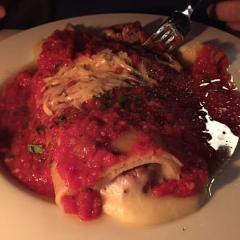 The Left Bank - Giant Ravioli with meatballs, banana peppers, and Italian cheeses topped with San Marzano tomato sauce. - New American Near Me - Buffalo, New York The Left Bank - Giant Ravioli with meatballs, banana peppers, and Italian cheeses topped with San Marzano tomato sauce. - New American Near Me - Buffalo, New York