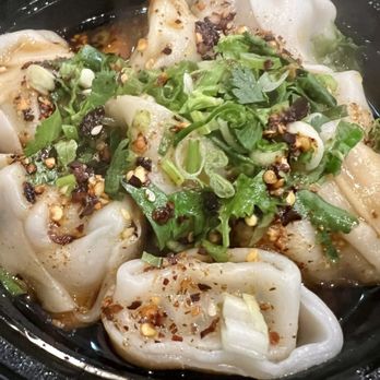 Vanessa's Dumpling House - Boiled chicken and shrimp dumplings with a spicy chili oil drizzle. Yum! - Chinese Near Me - New York, New York Vanessa's Dumpling House - Boiled chicken and shrimp dumplings with a spicy chili oil drizzle. Yum! - Chinese Near Me - New York, New York