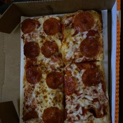 Little Caesar's Pizza - Multiple slices from different pizzas to make a whole