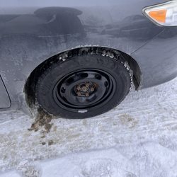 Canadian Tire - New front tire and rim