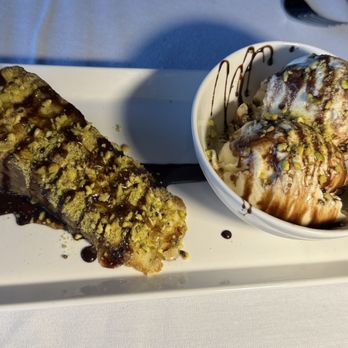 Luna Bar Bistro - Limoncello Cheesecake with Pistachio crust - Steakhouses Near Me - Wyandotte, Michigan