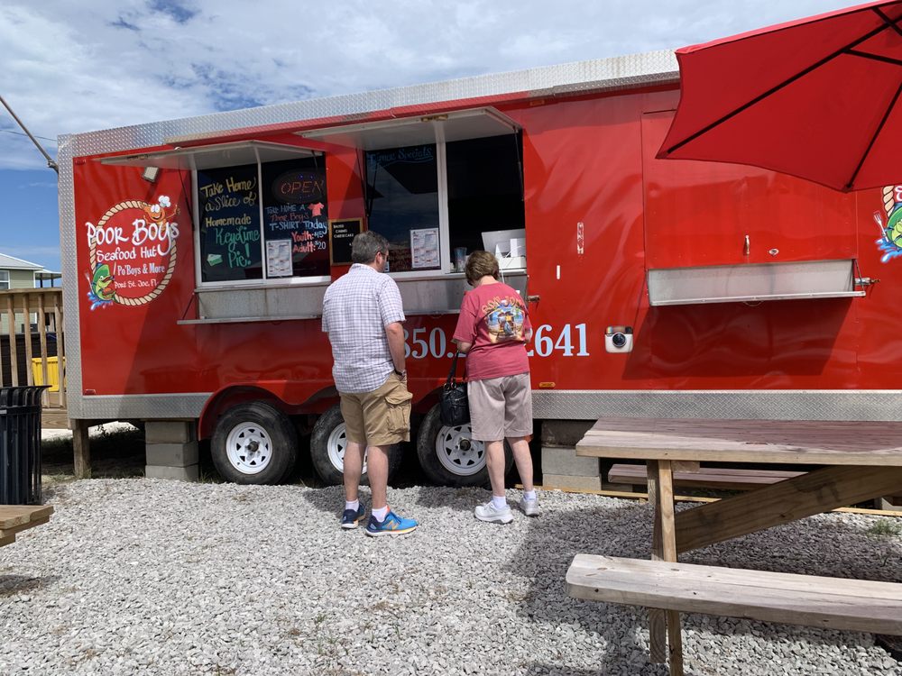 Poor Boys Seafood Hut Logo