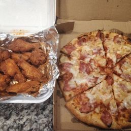 #1 special, 2 topping pizza and 8pc hot wings. To die for! Less than $30. delivered (not including tip). #1 special, 2 topping pizza and 8pc hot wings. To die for! Less than $30. delivered (not including tip).