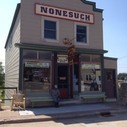 Nonesuch Gallery - The shop at the end of US 45. Check out the quiet guy on the bench.