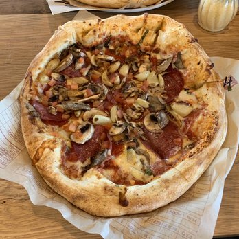 MOD Pizza - Doughy crust, red sauce, pepperoni, Parmesan, salami, mozzarella, mushrooms, minced and roast garlic. - Pizza Near Me - Mckinney, Texas MOD Pizza - Doughy crust, red sauce, pepperoni, Parmesan, salami, mozzarella, mushrooms, minced and roast garlic. - Pizza Near Me - Mckinney, Texas