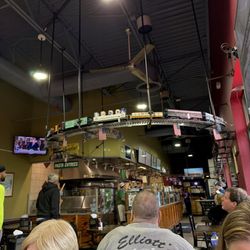 Mione's Pizza & Italian Restaurant - Dining room/ Train with the beer!