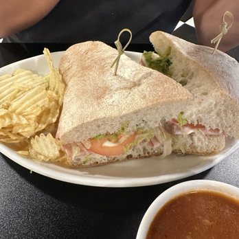 Enzo's - Mortadella sandwich with mozzarella, tomato, lettuce and pesto - Coffee & Tea Near Me - Matthews, North Carolina