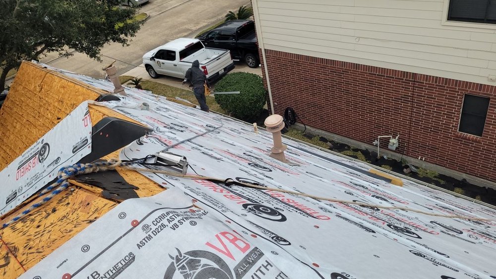 Slide of Trinity Roofing and Restoration