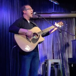 Dan Smith Will Teach You Guitar - David Acker performing on stage for family and friends at Dan Smith's Solo Performance Workshop.