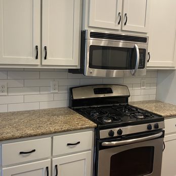 Tacoma Creations - a clean kitchen with stainless steel appliances - General Contractors Near Me Tacoma Creations - a clean kitchen with stainless steel appliances - General Contractors Near Me