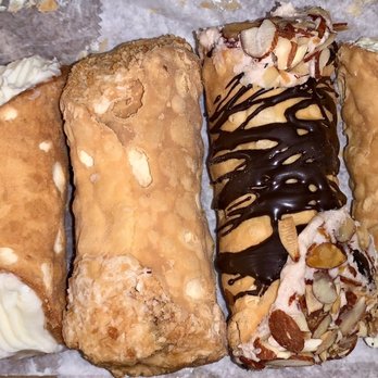 Bova's Bakery - Nutella and traditional Bova's cannoli in the left vs hazelnut, Amaretto, Limoncello from Mikes on the right - Bakeries Near Me - Boston, Massachusetts