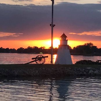 The Lagoon Saloon - a lighthouse at sunset - Pizza Near Me - Port Clinton, Ohio The Lagoon Saloon - a lighthouse at sunset - Pizza Near Me - Port Clinton, Ohio