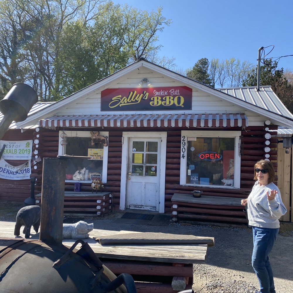 Sally's Smokin Butt BBQ - a woman standing in front of a restaurant - Barbeque Near Me - Fort Payne, Alabama Sally's Smokin Butt BBQ - a woman standing in front of a restaurant - Barbeque Near Me - Fort Payne, Alabama