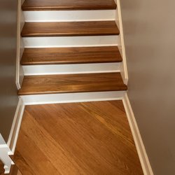 L&S Flooring Specialists - Beautiful wood floor staircase. Contact Us today for your next project: 678-559-8524