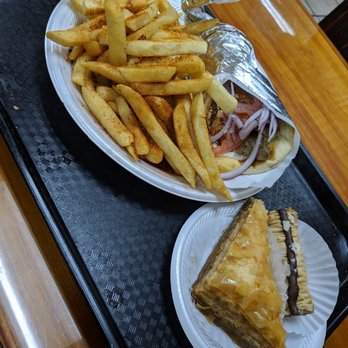 Gyro Grill Middle-Eastern Cuisine - Gyro meal, with seasoned fries, and both variations of baklava. - Middle Eastern Near Me - Ocala, Florida