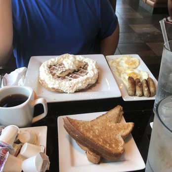 Keke's Breakfast Cafe - Banana nut caramel waffle with eggs and sausage - Breakfast & Brunch Near Me - Gainesville, Florida Keke's Breakfast Cafe - Banana nut caramel waffle with eggs and sausage - Breakfast & Brunch Near Me - Gainesville, Florida