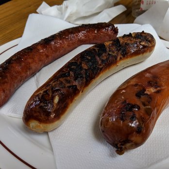 STERNEN GRILL - From left to right: Salsiccia piccante, St. Galler Bratwurst, Spezial Servelate - Barbeque Near Me - Zürich, ZH